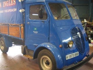 Transportes Apiche vehículo chatarra azul